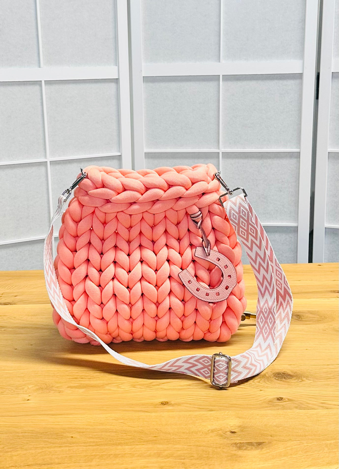 Chunky knit bag Pillow Bag in Fresh Salmon with textile strap and horseshoe pendant