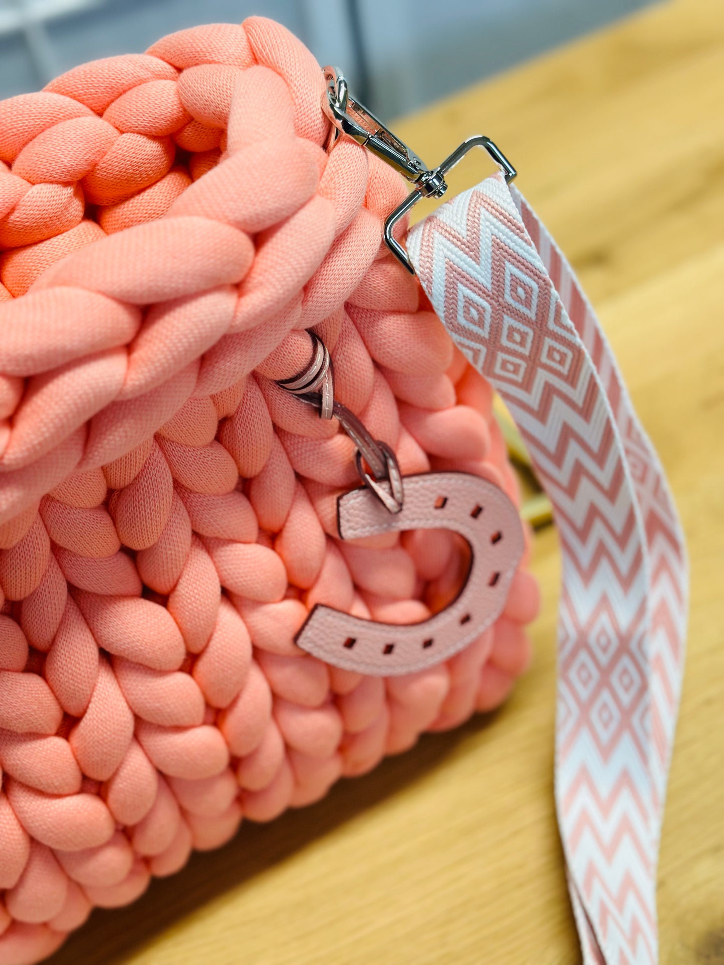 Chunky knit bag Pillow Bag in Fresh Salmon with textile strap and horseshoe pendant